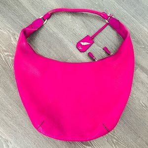 The DVF pink leather handbag is the statement bag.